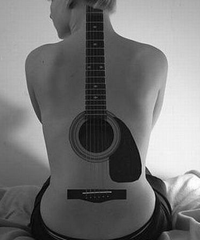 значение татуировки гитара