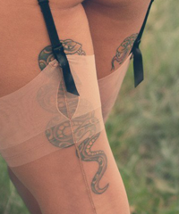 значение татуировки змея