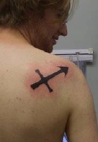 значение татуировки стрельца