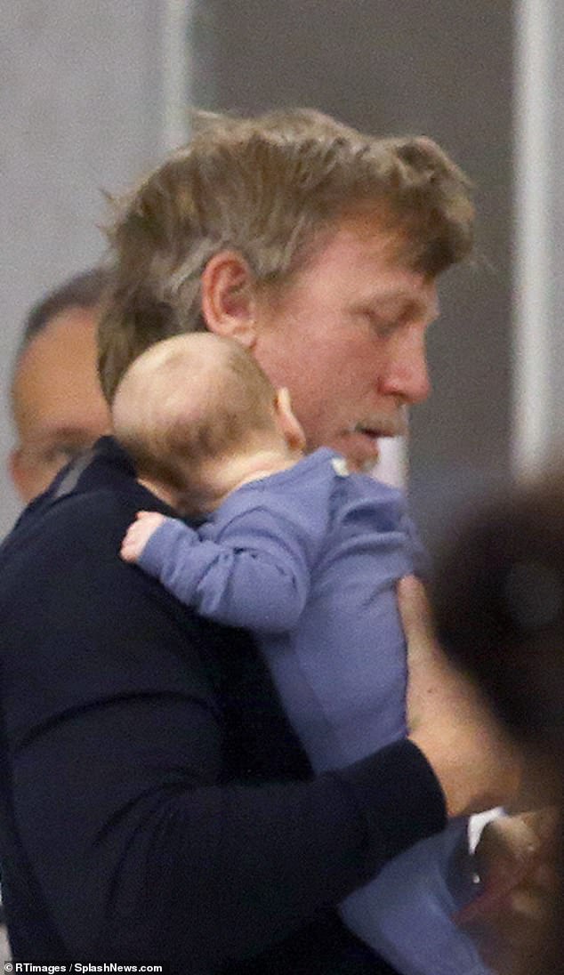 Craig, pictured with his daughter, will receive a reported £20 million to star in the 25th Bond film next year