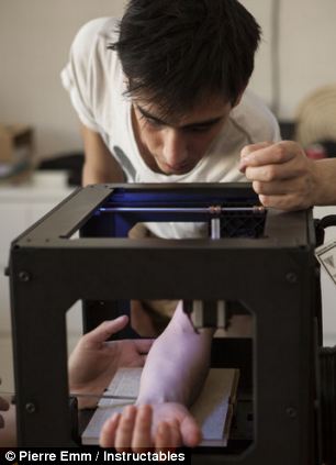 One volunteer is the proud of owner of what is thought to be the first tattoo etched by a machine (pictured) - a perfect circle on his forearm