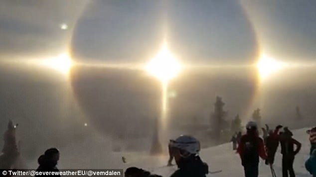 The halos are caused by both refraction, or splitting of light, and also by reflection, or glints of light from these ice crystals