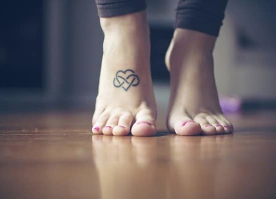 infinity feet tattoo