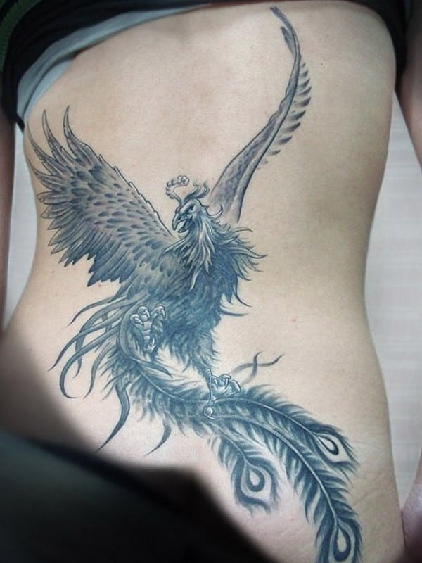 phoenix tattoo on side and stomach