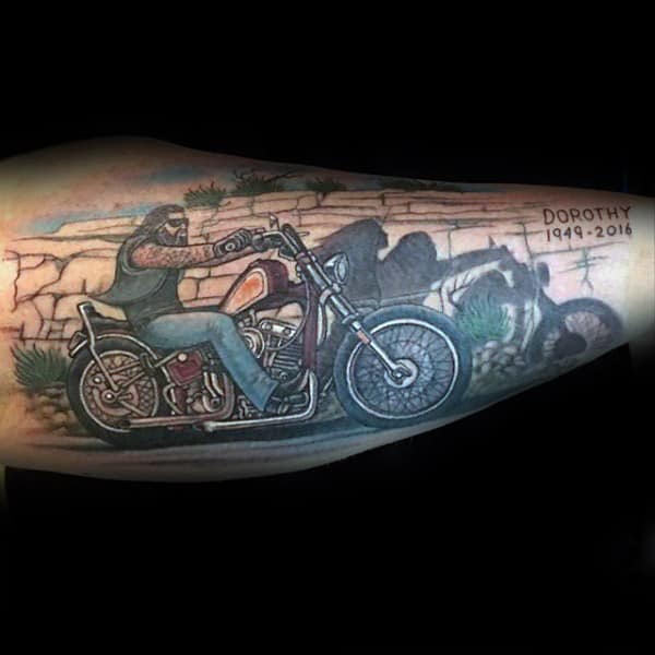 forearm motorbike tattoo