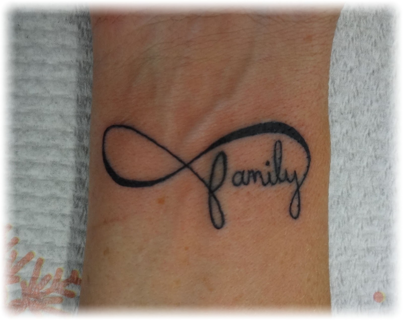 8. "Infinity Family Tattoo on Side of Hand" - wide 2